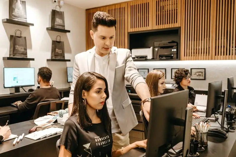 Man and Woman Working Together on Computer_AutoRABIT